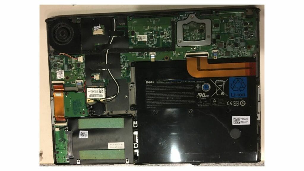 removing bottom panel of laptop computer to install SSD